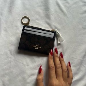COACH brown mini wallet. Original price is $78